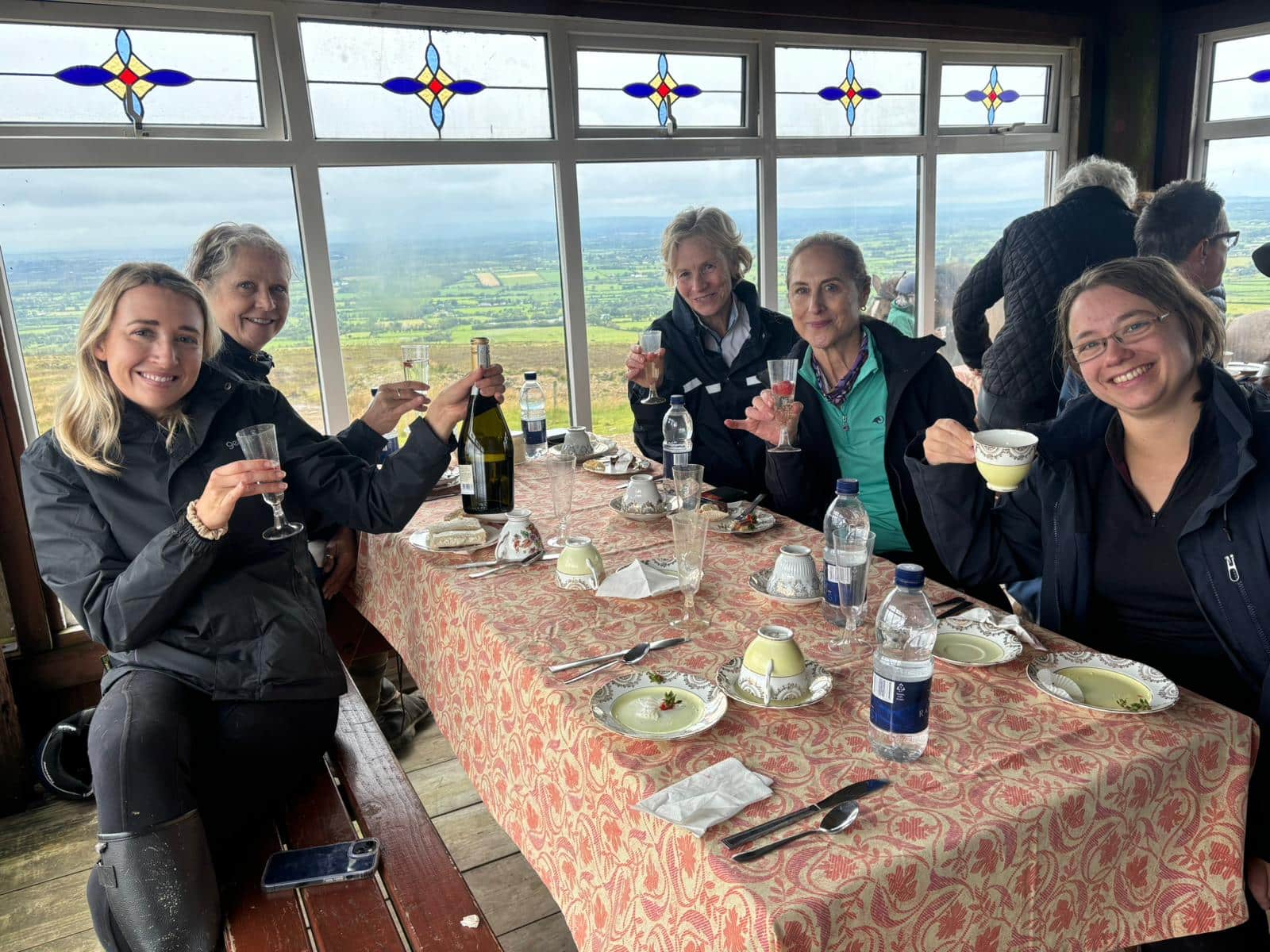Drone image of Sheans Horse Farm framed by the green Antrim hills